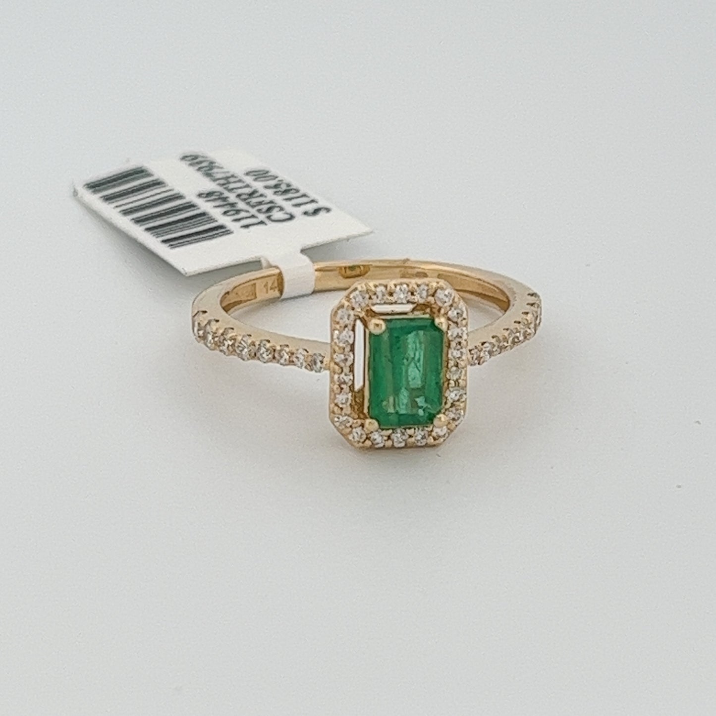 Esmeralda 0.52 CT Diamond 0.31 CT RING