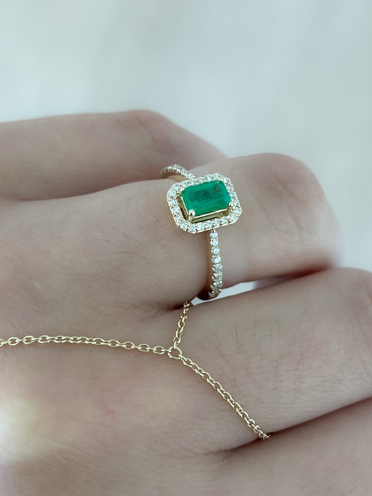Esmeralda 0.52 CT Diamond 0.31 CT RING