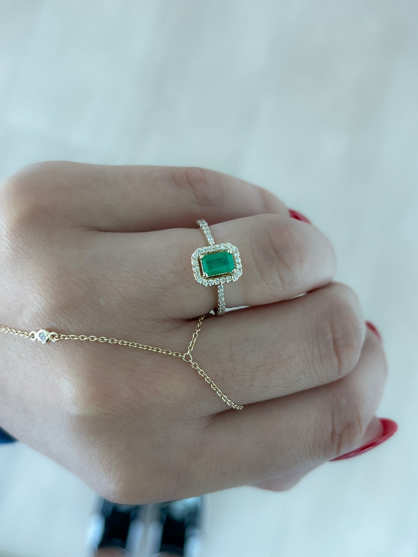 Esmeralda 0.52 CT Diamond 0.31 CT RING